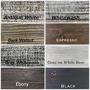 May include: A grid of eight wood finish samples labeled Antique White, Whitewash, Dark Walnut, Espresso, Gray Whitewash, Gray on White Base, Ebony, and Black. Each square displays a distinct wood grain texture and color variation for wood products.