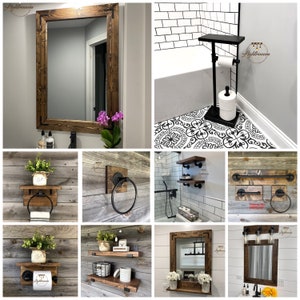 May include: A collection of bathroom accessories featuring dark stained wood and black metal hardware. Items include rectangular mirrors, wall-mounted shelves, toilet paper holders, towel rings, and towel bars, all designed with a consistent industrial aesthetic.