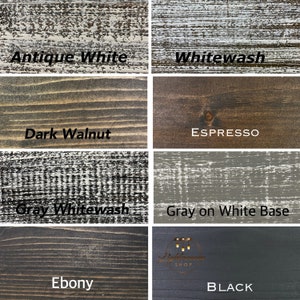 Puede incluir: Una cuadr&iacute;cula de ocho muestras de acabado de madera etiquetadas como Antique White, Whitewash, Dark Walnut, Espresso, Gray Whitewash, Gray on White Base, Ebony y Black. Cada cuadrado muestra la textura de la veta y el color de los tintes.