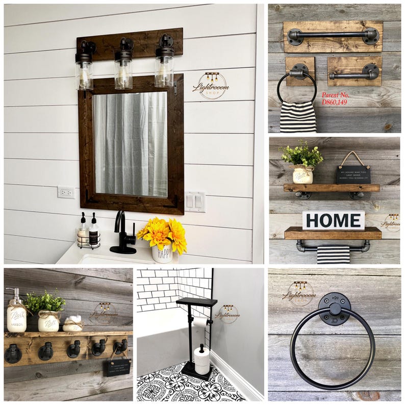 May include: A collection of rustic bathroom fixtures and decor. Includes a wooden-framed mirror with a light fixture, towel racks, shelves, and a toilet paper holder. The items are made of wood and metal, with a farmhouse style.