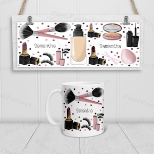 May include: A white ceramic mug with a pink, black and white design featuring makeup brushes, lipstick, eyelashes, and the name "Samantha".