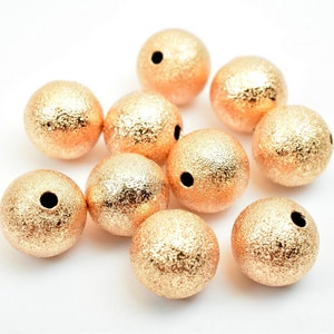 Espaciador de bola redonda de 10 mm con aspecto de oro rosa relleno, EP Stardust, para fabricación de joyas