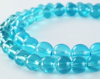 Perles de verre de couleur bleue rondes de 10 mm de brillance pour la fabrication de bijoux