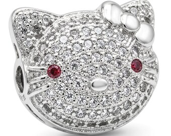 Cuentas espaciadoras de rodio con micro pavé de gato: piedras de circonita cúbica transparentes con detalle de ojo rojo (13x15,5 mm, resistentes al deslustre).