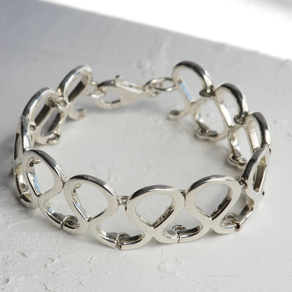 Chunky silver heart bracelet sale