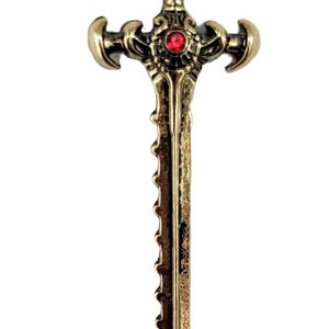 May include: A detailed, gold-colored miniature sword with a red gemstone in the center. The sword features an ornate handle and a serrated edge. The design is symmetrical and stands out against the white background.
