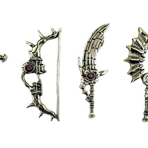 May include: Four fantasy-themed metal weapons are displayed against a white background. The weapons include a sword, a bow, a curved blade, and a staff, all with intricate designs and red jewel accents. The metallic finish gives them a vintage look.