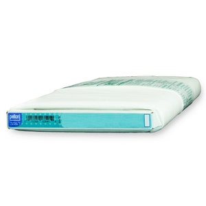 May include: A white Pellon® 950F fusible interfacing for crafts and sewing projects. The interfacing is rolled up and the packaging has a blue label with the Pellon® logo and a barcode.
