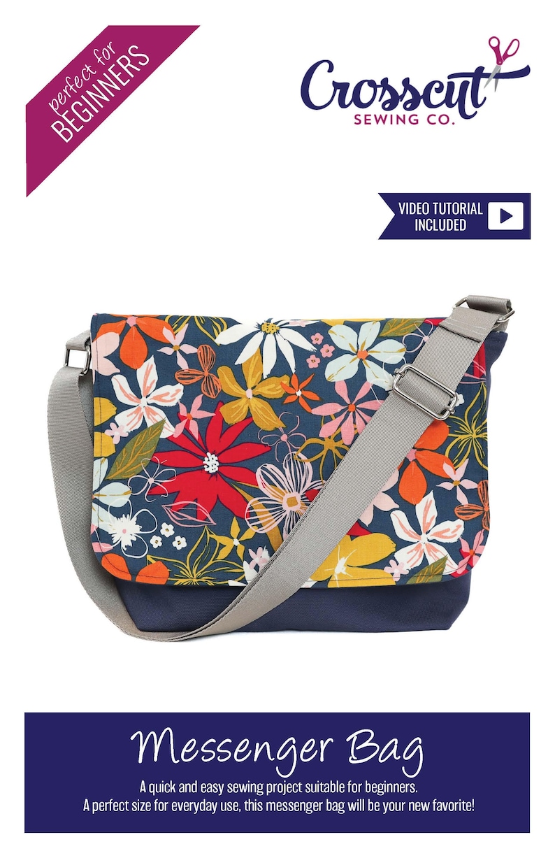 May include: A floral messenger bag with a gray strap and a navy blue base. The bag has a floral print with red, yellow, and white flowers on a dark blue background. The text "Crosscut Sewing Co." and "Video Tutorial Included" is visible on the image.