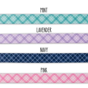 May include: Four fabric ribbon samples in different colors and patterns. The colors are mint, lavender, navy, and pink. Each ribbon has a plaid pattern.