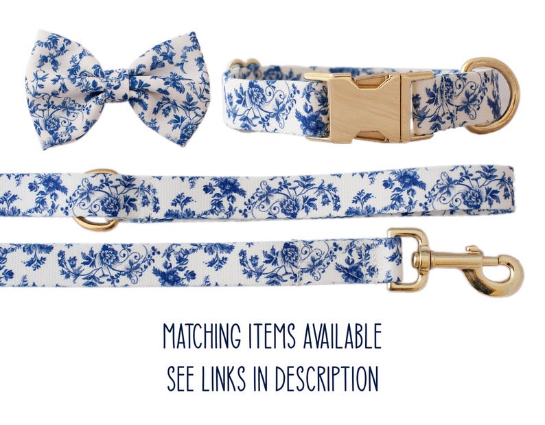 May include: A matching dog collar, leash, and bow tie set. The set features a white background with a blue floral pattern. The collar has a gold buckle, and the leash has a gold clasp. The bow tie is pre-tied. The text "MATCHING ITEMS AVAILABLE SEE LINKS IN DESCRIPTION" is at the bottom.