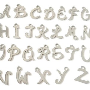 May include: A set of 26 silver charm pendants, each featuring a different letter of the alphabet in a cursive script style.