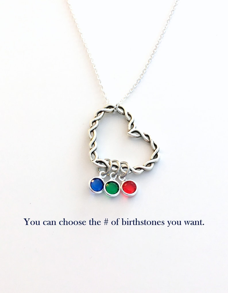 May include: A silver necklace with a braided heart pendant and three birthstone charms in blue, green, and red. You can choose the number of birthstones you want.