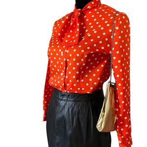 orange polka dot top