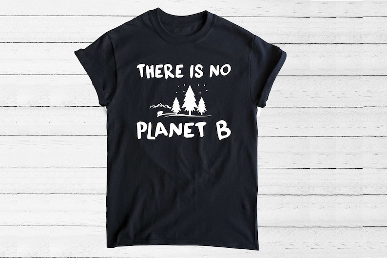 May include: Black t-shirt with white text that reads "THERE IS NO PLANET B" and a graphic of three pine trees and a small camper.