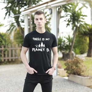 May include: A black t-shirt with a white graphic that says "There is no Planet B" with a small illustration of trees.