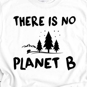 May include: White t-shirt with black text that reads "There is no planet B" and a graphic of a mountain range with three pine trees and a bear.