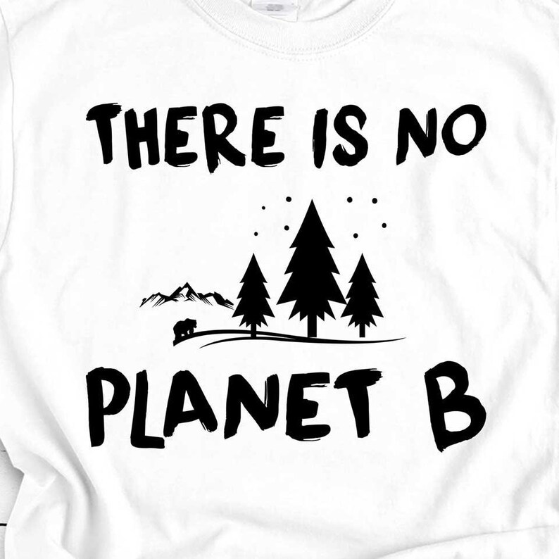 May include: White t-shirt with black text that reads "There is no planet B" and a graphic of a mountain range with three pine trees and a bear.