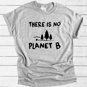 May include: Gray t-shirt with black text that reads "THERE IS NO PLANET B" and a graphic of three pine trees and a bear.