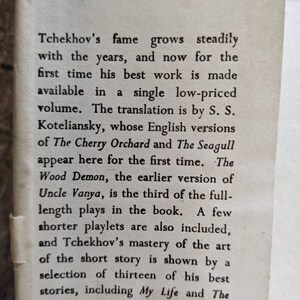 May include: A black and white book cover with the title "Tchekhov's" in large, bold font. The text describes the book as a collection of the author's best work, including plays and short stories.