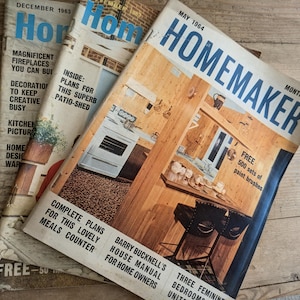 May include: Three vintage Homemaker magazines from December 1963, November 1963, and May 1964. The covers feature blue text, photographs of home interiors, and headlines including Magnificent Fireplaces, Plans for This Superb Patio-Shed, and Free 500 Sets of Paint Brushes.