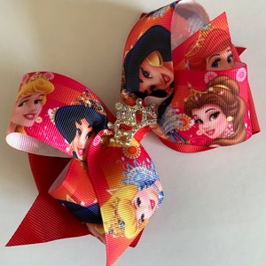 Disney Princess Bow All the Princesses Bow Many Princesses on One  Bow Red Princess Bow with shimmering Tiara in Center