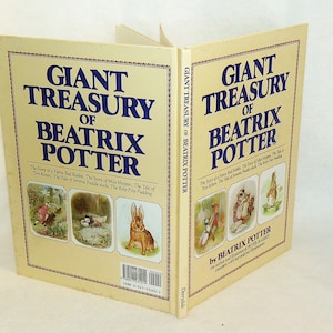 May include: A yellow book with the title "Giant Treasury of Beatrix Potter" on the cover. The book features illustrations of Peter Rabbit, Jemima Puddle-Duck, and Tom Kitten.