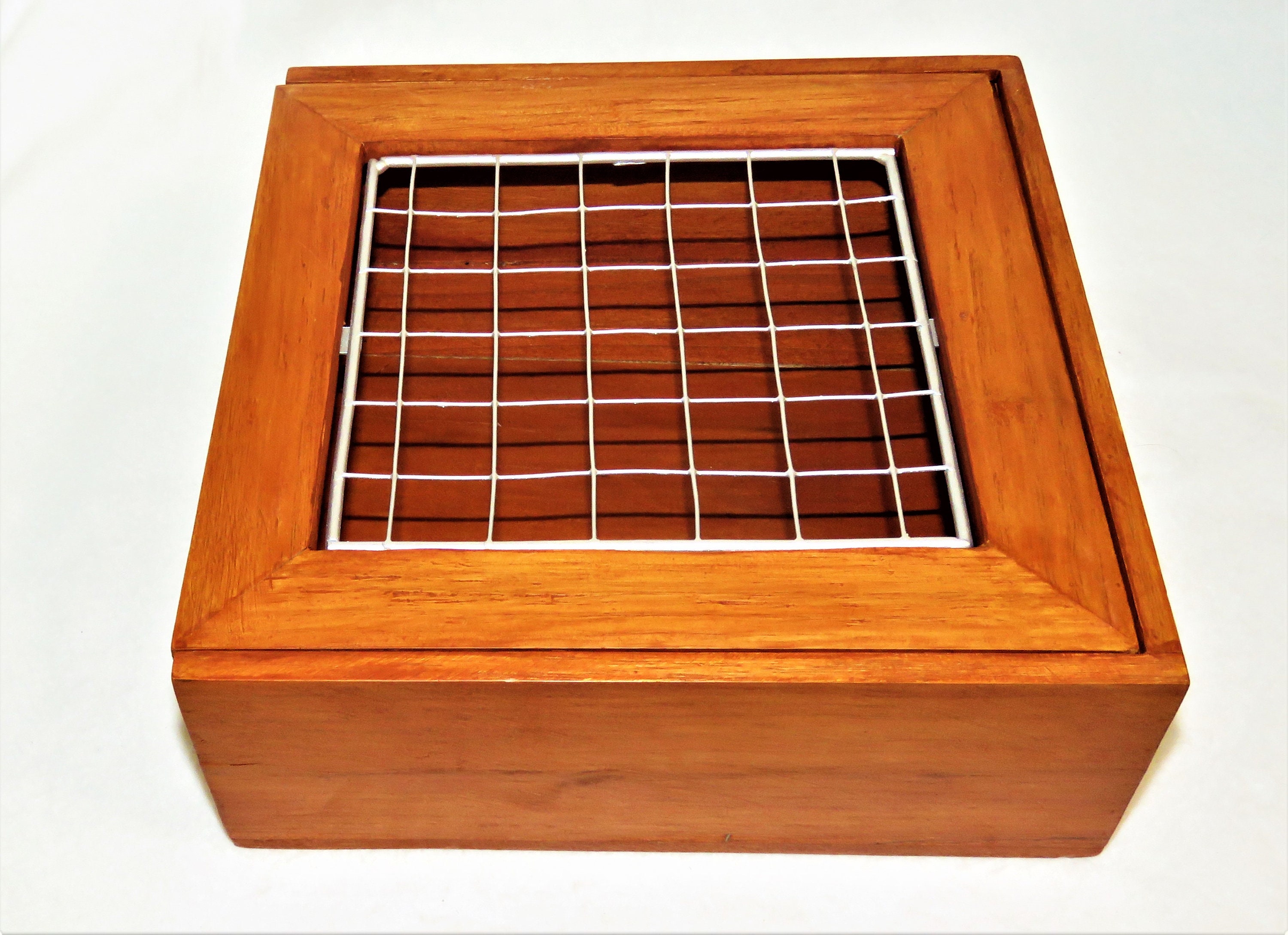 Beautiful Wooden Box With Sliding Lid and Metal Grate in the