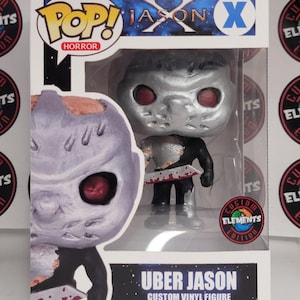 May include: A Pop! Horror figure of Jason X in a display box. The figure has a silver mask, red eyes, and a black outfit, holding a bloody machete. The box reads "Uber Jason" and "Custom Vinyl Figure."