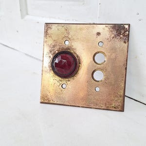Bronze Switch Cover with Indicator Light, Ruby Red Faceted Glass