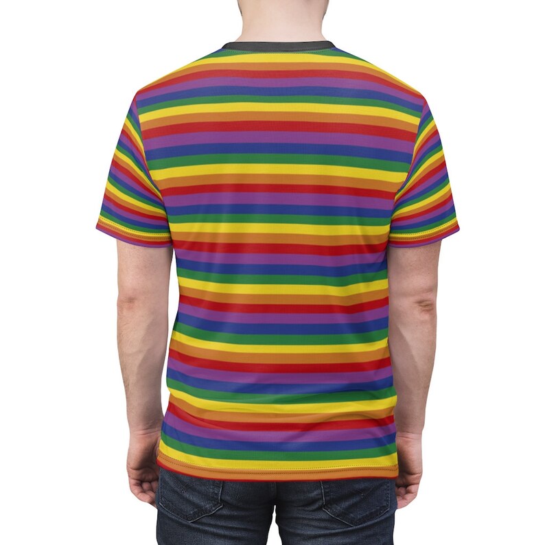 May include: A short-sleeved t-shirt with a rainbow striped pattern. The shirt is made of a soft, comfortable material and is perfect for everyday wear.