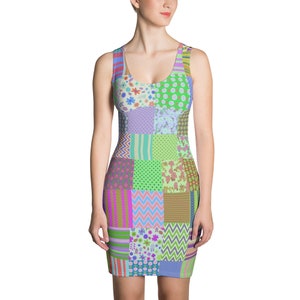 May include: A sleeveless dress with a patchwork design featuring various colours and patterns, including green, pink, blue, and purple.