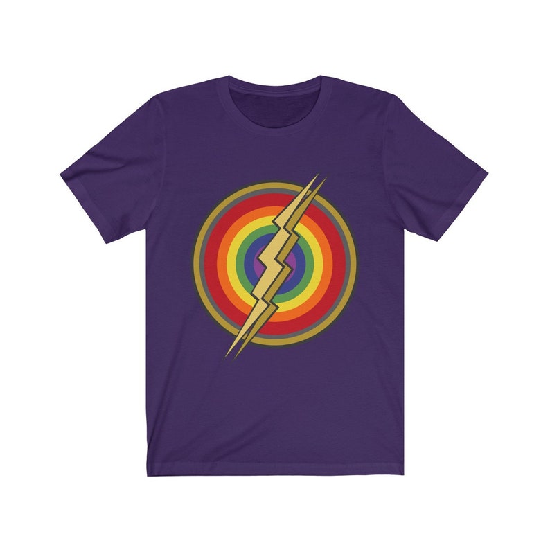 May include: Purple short-sleeved t-shirt with a rainbow circle and a gold lightning bolt graphic.