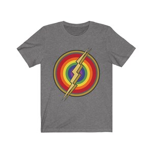 May include: A heather gray t-shirt with a rainbow circle and a gold lightning bolt graphic.