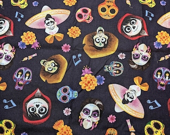 May include: A colorful fabric with a repeating pattern of sugar skulls, flowers, and characters from the movie Coco. The characters include Miguel, Hector, and Mama Imelda. The fabric is perfect for crafting projects, quilting, and home decor.