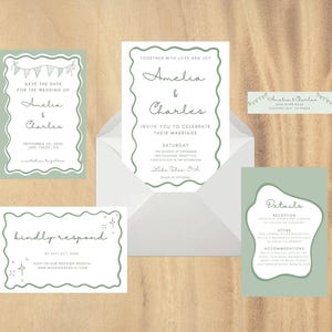 May include: A set of wedding stationery in shades of green and white, including an invitation, save-the-date card, RSVP card, details card, and envelope. The invitation features the names "Amelia & Charles" and the text "Invite you to celebrate their marriage."
