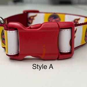 May include: Red dog collar with a red plastic buckle. The collar features a pattern of yellow, white, and maroon stripes with a logo. The text "Style A" is printed in black.
