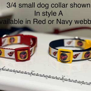 May include: Two small dog collars in style A. One is red with a red buckle, the other is navy blue with a yellow buckle. Both collars have a white and yellow patterned ribbon with a logo and the text "F". The text in the image says "3/4 small dog collar shown In style A Available in Red or Navy webbing!"