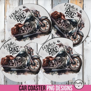 May include: Four round car coasters with a watercolor design of a motorcycle. Each coaster features a motorcycle with brown leather saddlebags and the text "I'd Rather Be On My Bike".