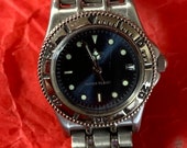 Ladies Citizen wristwatch, circular Dark Blue dial and date aperture