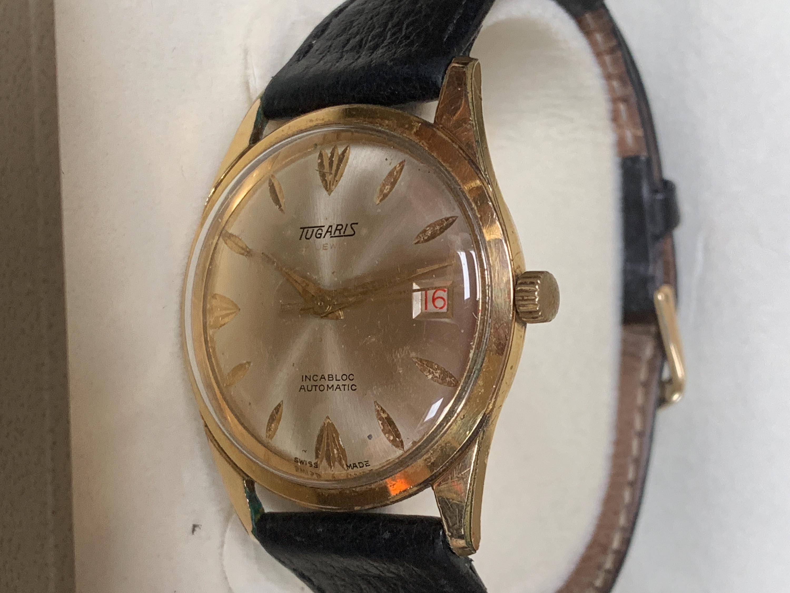 TUGARIS 自動巻き　６０年代？　スイス製　２５石　黒文字盤　動作品　ジャンク HA-6765| TUGARIS タガリス 自動巻き 25石 未使用 希少品