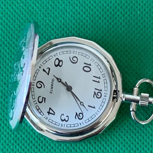 May include: A set of three ceramic mugs with a speckled, matte finish. The mugs are in shades of blue, green, and white. Each mug has a simple, modern design and a comfortable handle. Perfect for coffee or tea.