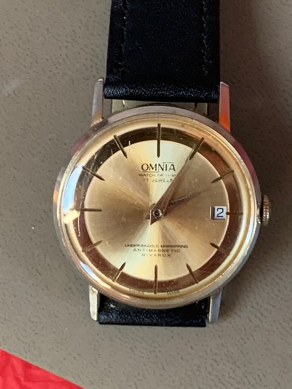 Vintage c1960s Omnia De Luxe 17 jewels, rare, Gold dial watch                                                                      .