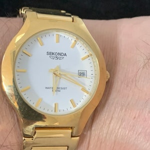 Gents Sekonda 5 ATM gold tone Quartz Watch With White Dial