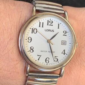 Lorus Orologio Uomo Analogico Al Quarzo Con Cinturino In Pelle E Acciaio, Cassa Rotonda In Acciaio Inox, Vetro Minerale
