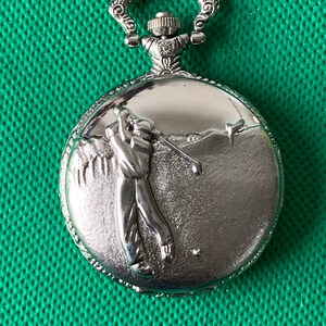 Quartz full hunter Pocket / fob watch in working order with Golf design