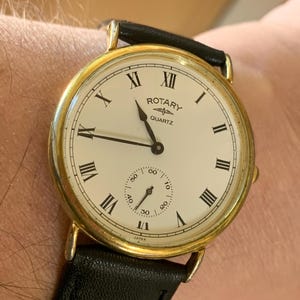Vintage unisex Gold Tone Rotary Quartz Watch with sub-second Dial