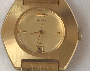 Vintage Seiko Woman&#39;s 2202 Silver Angel Vintage Mechanical Gold Tone Bangle Band