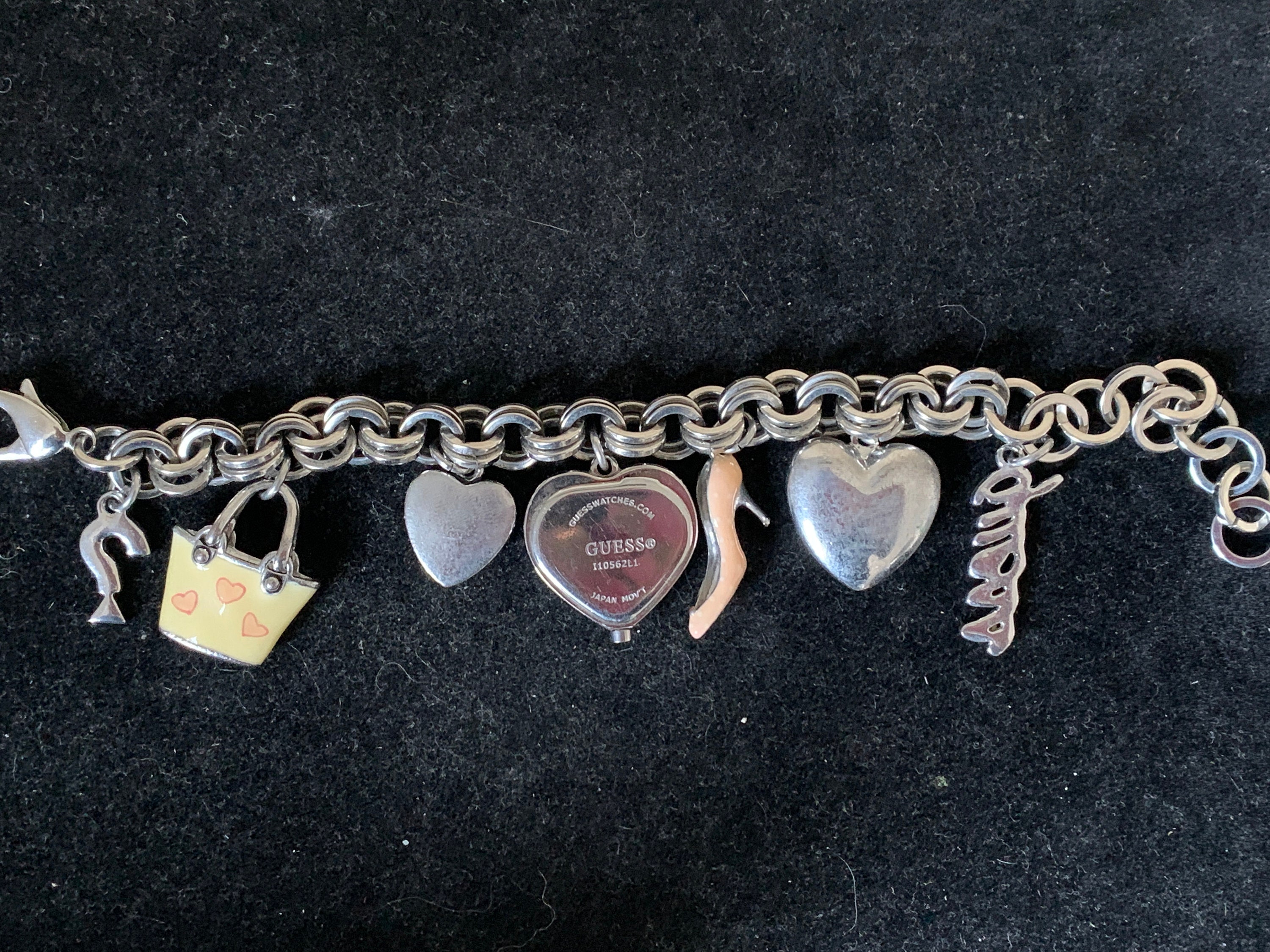 Guess bracelet with charms best sale