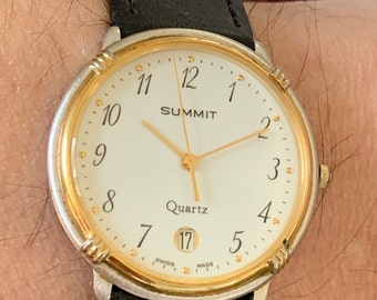 Beautiful Vintage Gents 33mm Gold and silver tone Summit Quartz Watch with the date at the 6 boxed